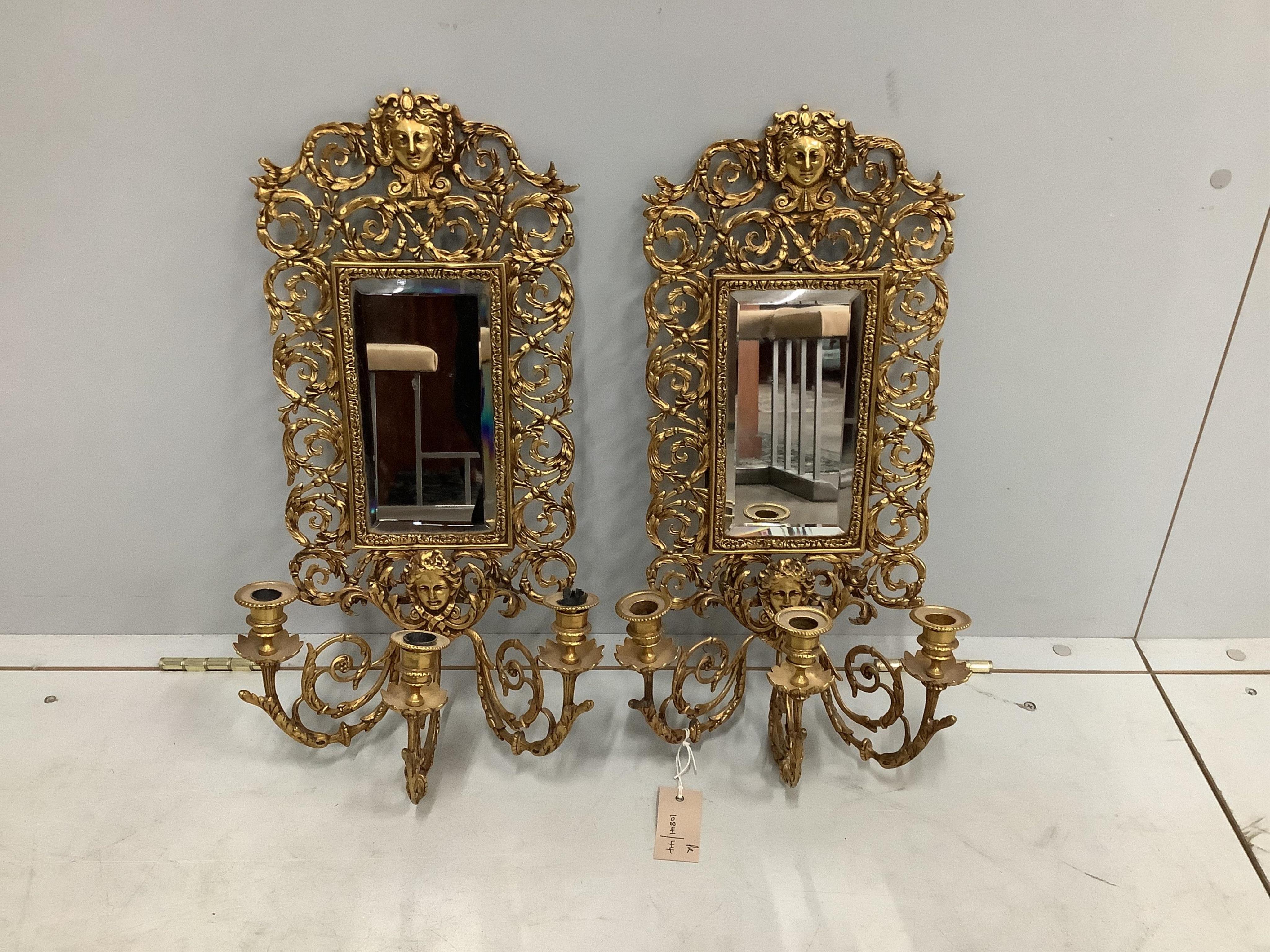 A pair of Victorian style gilt metal three branch girandole, width 28cm, height 52cm